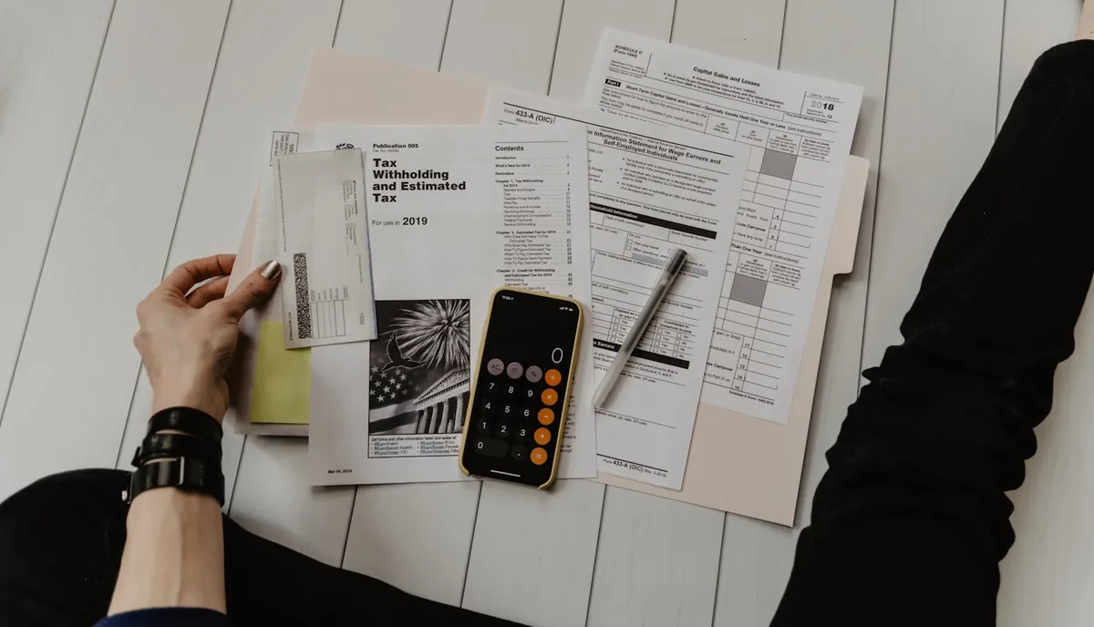 A stack of paper documents being translated and digitized